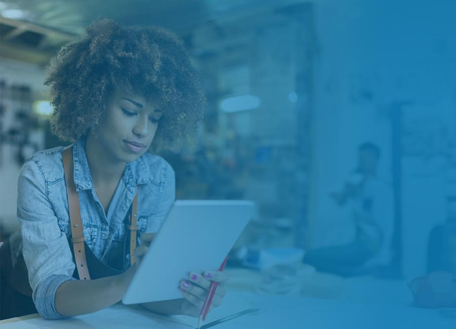 FNBM Merchant Services Lady with Ipad