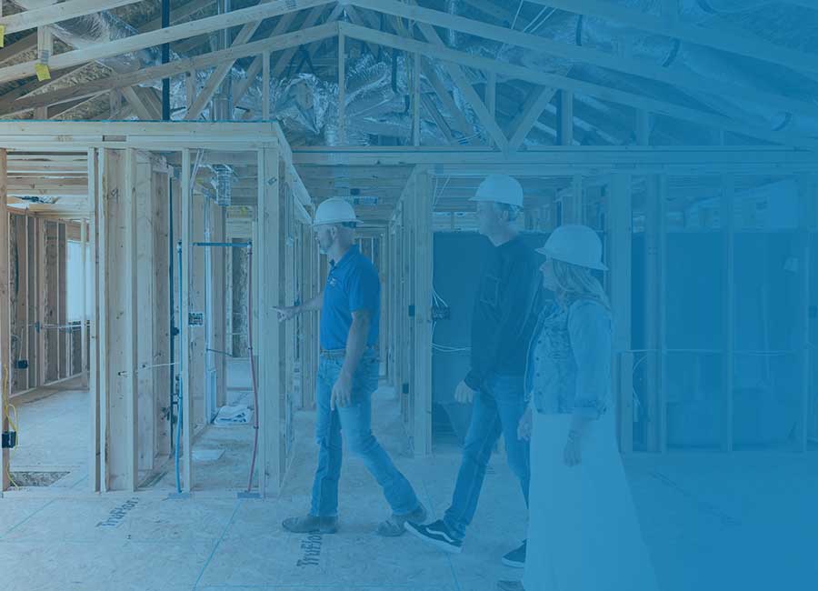 Man shows woman vision of housing construction